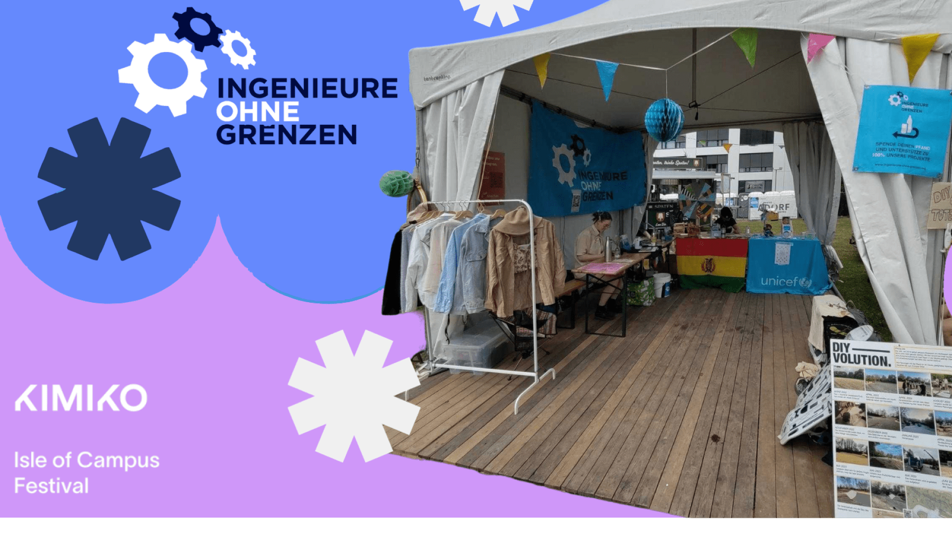 Informationsstand von IOG auf einem Festivalgelände. Bunte Fahnen zieren den Stand